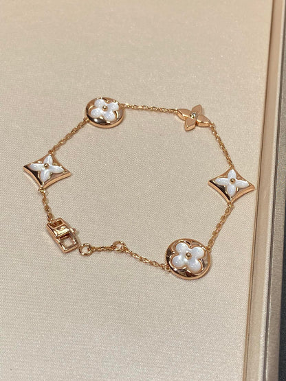 [Star Jewelry]STAR AND SUN 5 MOTIF MOP PINK GOLD BRACELET