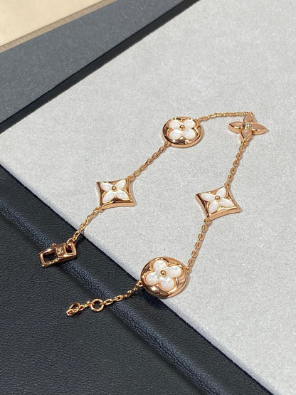 [Star Jewelry]STAR AND SUN 5 MOTIF MOP PINK GOLD BRACELET