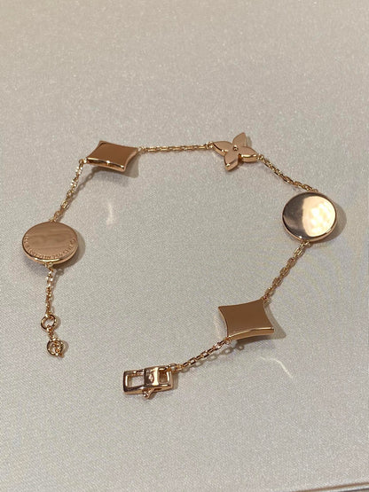 [Star Jewelry]STAR AND SUN 5 MOTIF MOP PINK GOLD BRACELET