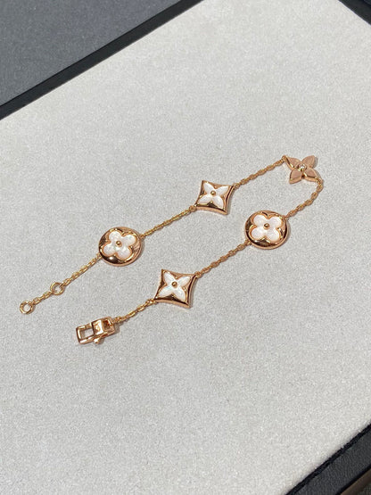 [Star Jewelry]STAR AND SUN 5 MOTIF MOP PINK GOLD BRACELET
